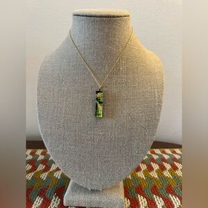 Vintage, hand crafted glass necklace pendant on a 19” chain.